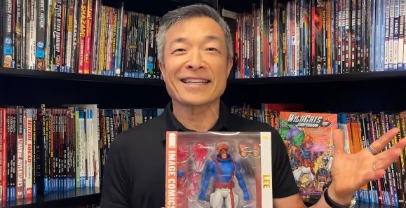Jim Lee holding the McFarlane Toys Image Comics Founders Series Spartan figure from WildC.A.T.s